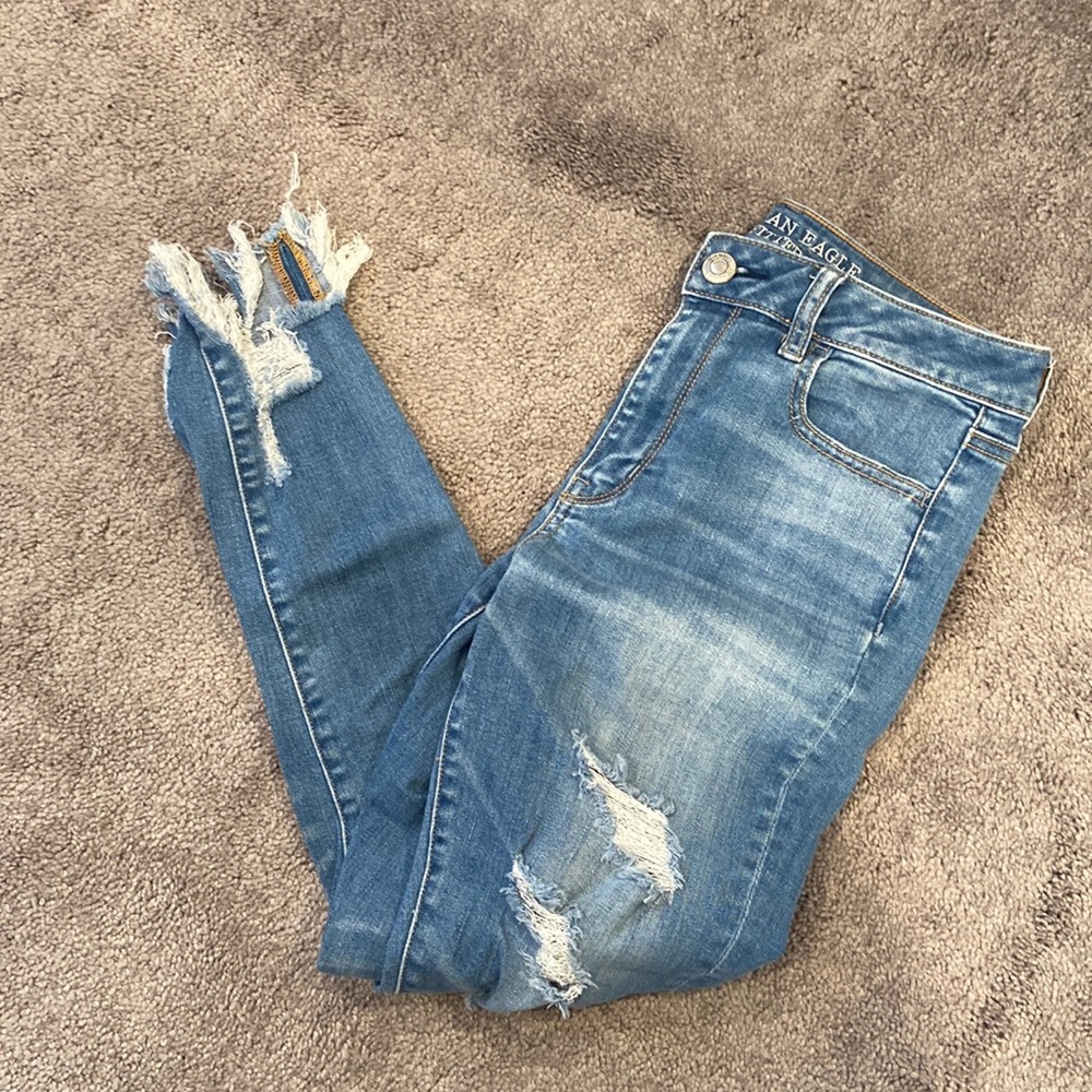 Super stretch high rise jetting distressed ankles